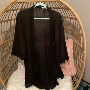 Black cover up / shall